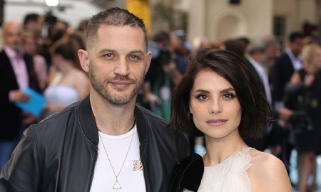 Tom Hardy posing with his current wife Charlotte Riley. When did they marry? Do they have children from their nuptials?